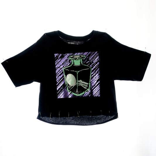 Alternative cropped tee with colorful bottle drink graphic on the front.