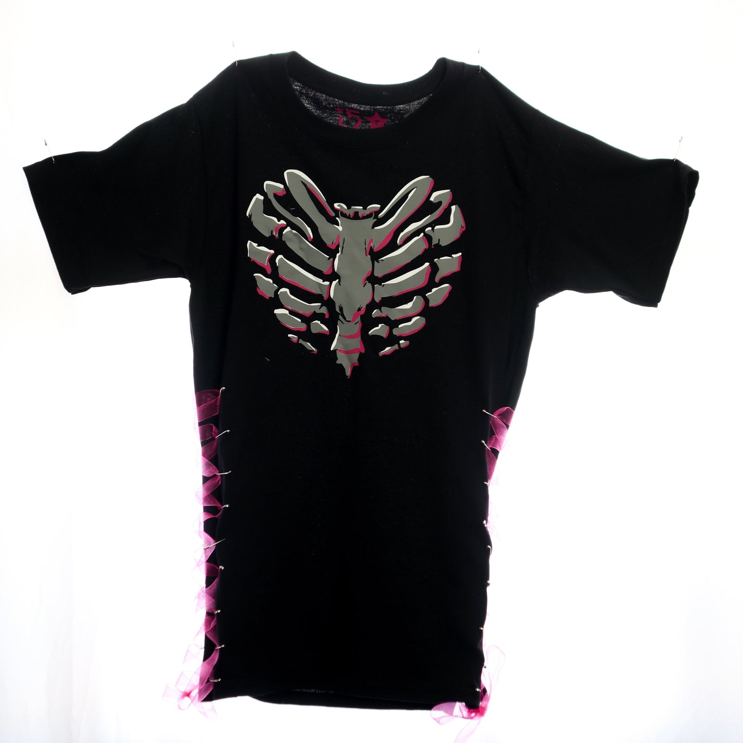 Edgy streetwear T-shirt with side corset ties and heart cage artwork.