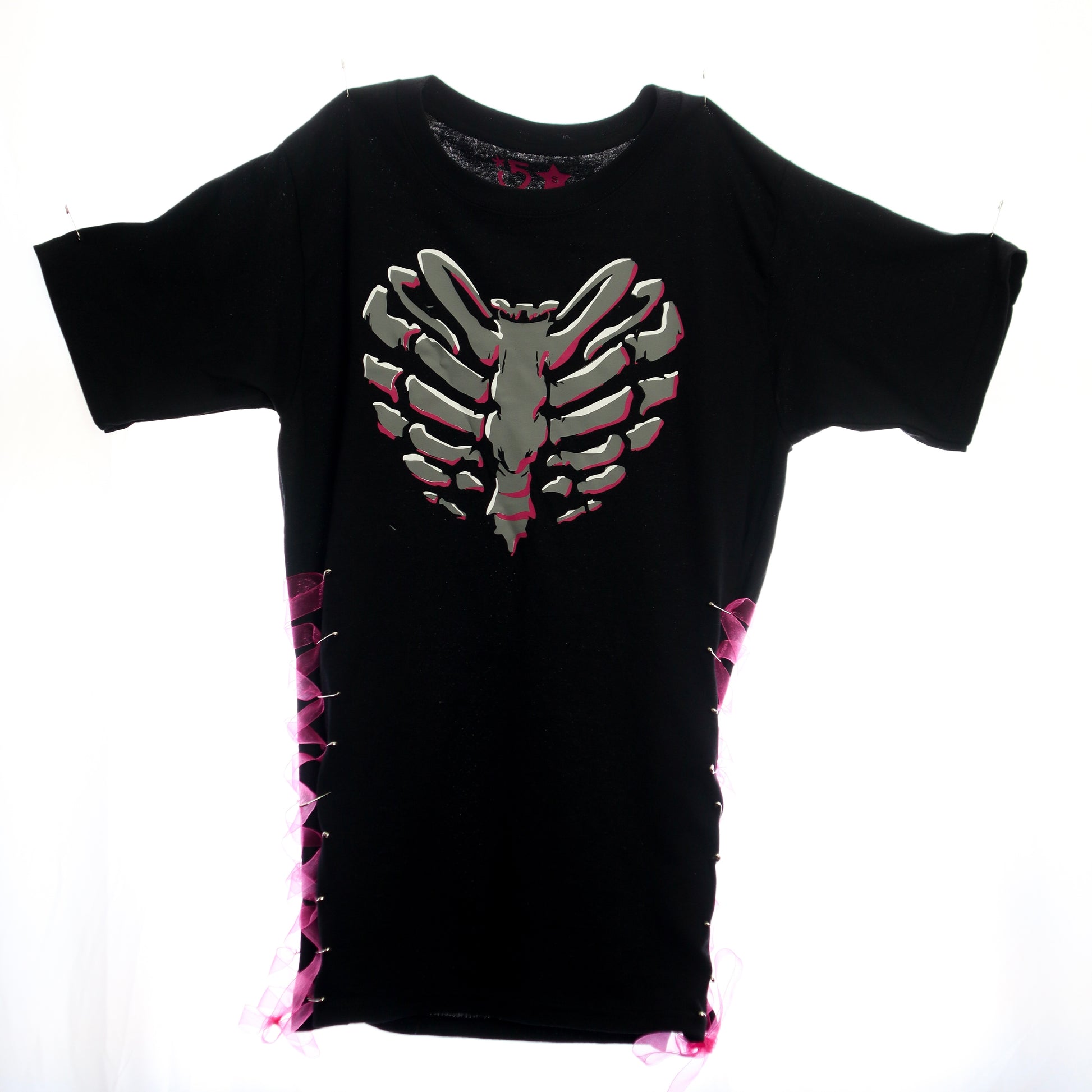 Edgy streetwear T-shirt with side corset ties and heart cage artwork.